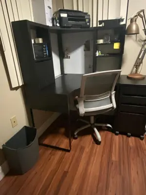 an office with a desk with a chair and a computer at Spanish Style House - Free Parking in Miami