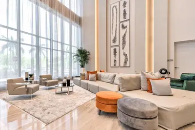 a living room with a couch and a table at Luxury 2BD Apartment in Downtown Doral in Miami