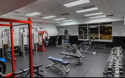 a gym with several treadmills and exercise machines at Luxury 1 Bedroom Apartment • Brickell • Unique Views in Miami