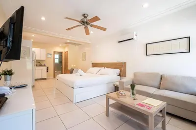 a living room with a bed and a couch at Casa Del Mar Master in Hollywood