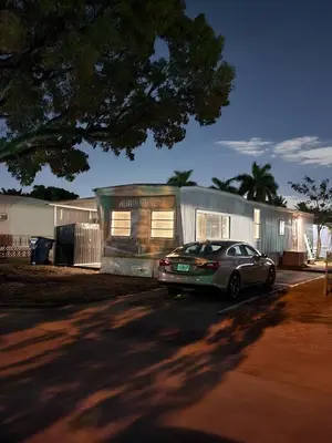 a car parked in front of a house at 1161 Studio 2 Main Miami in Miami