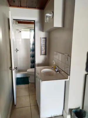 a bathroom with a sink and a toilet at Cozy apartment in quite zone in Hollywood
