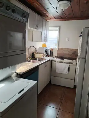 a kitchen with a sink and a stove at Cozy apartment in quite zone in Hollywood
