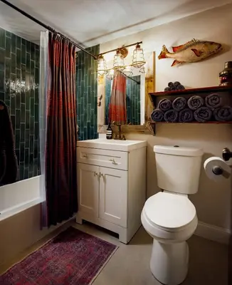 a bathroom with a toilet and a sink and a shower at The Captain's Landing - 4 bedroom - 2 bathroom - Outdoor soaking tub - Adventure home in Fort Lauderdale