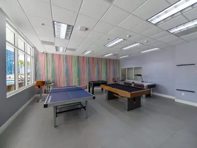a large room with two ping pong tables in it at Spectacular apartment in Heart of Brickell in Miami