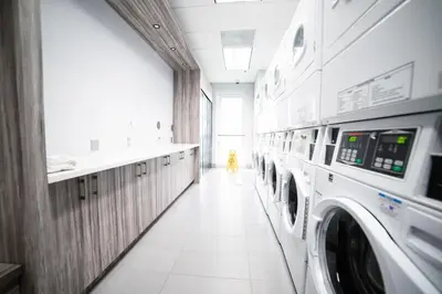 a laundry room with a washer and dryer at High Rise Brickell Modern Studio in Miami