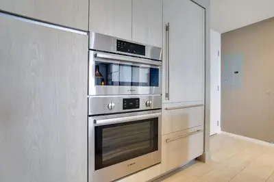 a kitchen with stainless steel appliances in a room at Upscale Condo with Pool Access in Hyde Beach House! in Hollywood