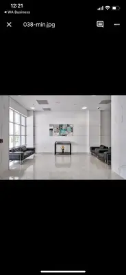 a picture of a room with black and white furniture at Apartments TVG Miami by the ocean ! in Miami Beach