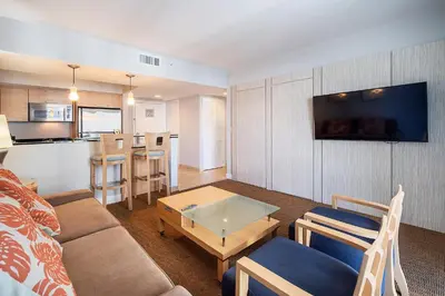 a living room with a couch and a table at Sunny Isles 1BDR Sea View and Pool in Miami Beach