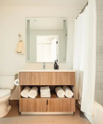 a bathroom with a sink and a mirror at Flow Hotel Fort Lauderdale in Fort Lauderdale