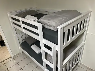 a white bunk bed in a room at Single Size TOP Bunk Bed - Mixed Shared ROOM in Miami
