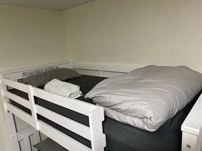 a white bunk bed in a small room at Single Size TOP Bunk Bed - Mixed Shared ROOM in Miami