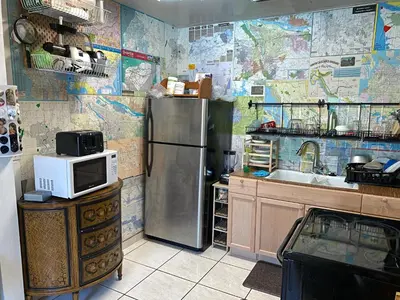 a kitchen with a refrigerator and a microwave at Single Size TOP Bunk Bed - Mixed Shared ROOM in Miami