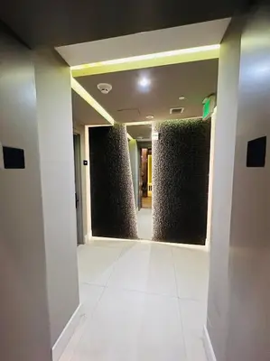 a hallway with green walls in a building at Dramatic Ocean View at Hyde Resort And Residences in Hollywood