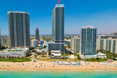 a beach in front of a city with tall buildings at Dramatic Ocean View at Hyde Resort And Residences in Hollywood
