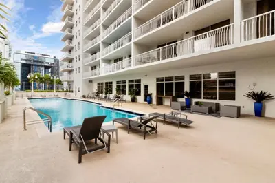 a swimming pool in the middle of a building at Luxury Accommodations Brickell in Miami