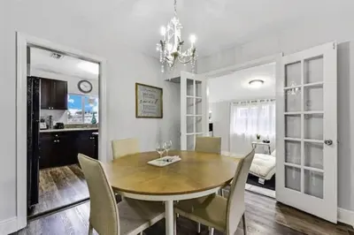 a dining room with a table and chairs at Home wworkstation by PMI unit 2908 in Hollywood