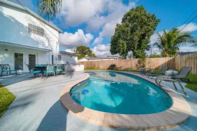 a swimming pool in the backyard of a house at Pool Home in Hollywood