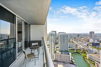 a balcony with a view of a city at Majestic High Rise Unit with Ocean view in Miami