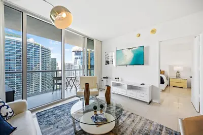 a living room with a view of a city at Majestic High Rise Unit with Ocean view in Miami