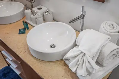 a bathroom counter with a sink and a white sink at Splendid Unit outstanding View-W Hotel Brickell in Miami