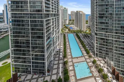 an aerial view of a city with tall buildings at Breathtaking Ocean View Unit Icon Brickell W in Miami