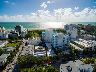 an aerial view of a city and the ocean at Dream Destinations at Ocean Place in Miami Beach