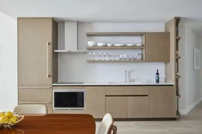 a kitchen with a sink and a table in a room at Four Seasons Hotel and Residences Fort Lauderdale in Fort Lauderdale