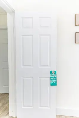 a room with a white door with a sign on it at MIAMI PARADISE in Miami