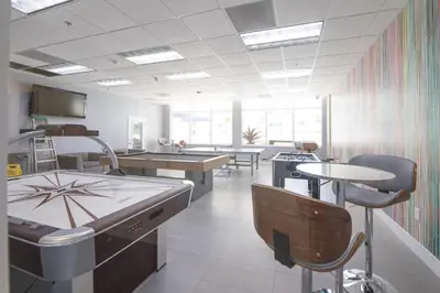 a restaurant with tables and chairs in a room at LUXURY 3 Bedrooms BRICKELL BAY APARTMENT in Miami