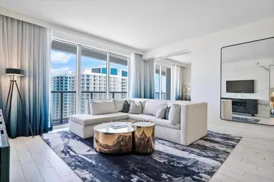 a living room with a couch and a large window at W Residences 2 Bedroom Suite condo in Fort Lauderdale