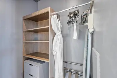 a closet with a towel hanging on a rack at W Residences 2 Bedroom Suite condo in Fort Lauderdale