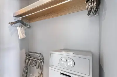 a microwave in a kitchen with a shelf at W Residences 2 Bedroom Suite condo in Fort Lauderdale