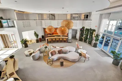 a large living room with couches and a table at Hotel Sheldon in Hollywood