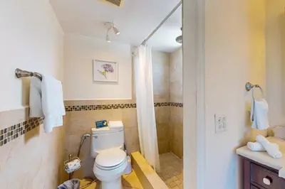 a bathroom with a toilet and a shower at Samira's South Beach Paradise in Miami Beach