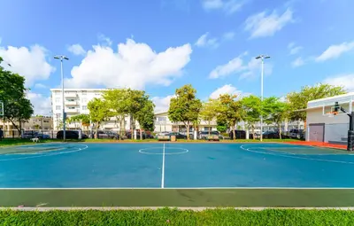 a basketball court in front of a building at PRAIA Hotel Boutique & Apartments Miami Beach in Miami Beach