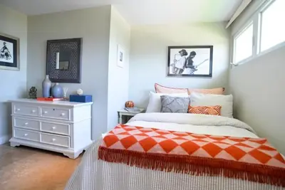 a bedroom with a bed and a dresser in it at Villa Naomi - Luxury Design New Home in Miami