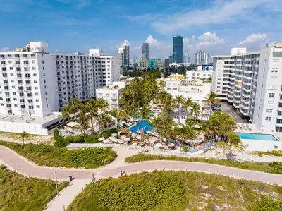 an aerial view of a city with tall buildings at The Savoy Hotel & Beach Club in Miami Beach