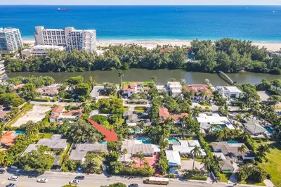 an aerial view of a resort near the beach at NEWLY RENOVATED POOL, HOT TUB, & EPIC BACKYARD in Fort Lauderdale