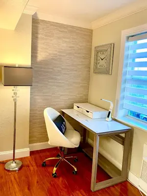 an office with a desk and a white chair at Deluxe waterfront one bedroom apartment with Miami Skyline view, free parking 5 mins drive to Miami Beach in Miami Beach