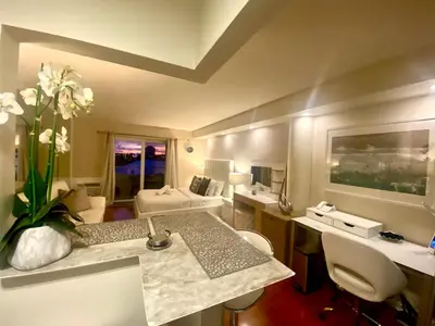 a bathroom with a sink and a toilet in a room at Modern waterfront apartment with Miami Skyline view, free parking 5 mins drive to Miami Beach in Miami Beach