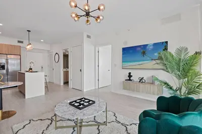 a living room with a couch and a table at LUXURY 1 BDRM/1B APT IN MIAMI DESIGN DISTRICT AREA in Miami