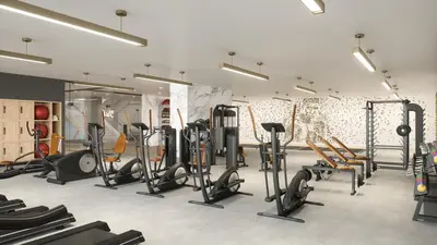 a gym with a lot of treadmills and ellipticals at Global Luxury Suites Miami Worldcenter in Miami