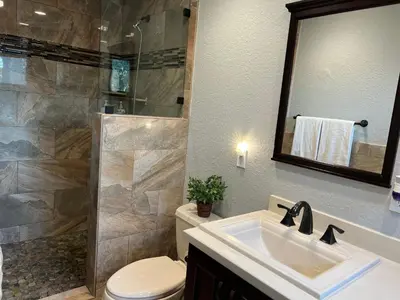 a bathroom with a toilet and a sink and a shower at 3 Bed - Sleeps 6 - Free Parking - 5 Mins to Beach in Hollywood