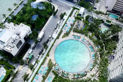 an overhead view of a swimming pool at a resort at Luxe Miami Condo with Community Pool and Hot Tub! in Miami