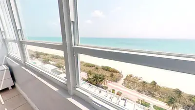 a view of the beach from a window in a condo at Castle 1131 in Miami Beach
