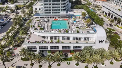 an aerial view of a building with a swimming pool at WVR Vacation Residences 1707 in Fort Lauderdale