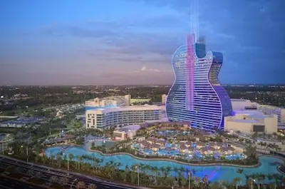 a view of a large building with a guitar shaped building at Private Rooms close to Miami Airport - Free parking - 01 in Miami