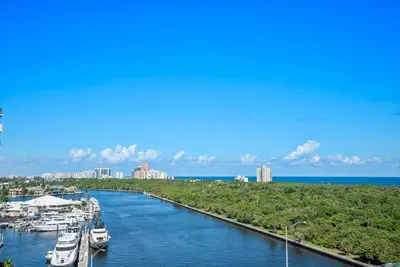 a group of boats are docked in a river at Avi Lux Stay in Fort Lauderdale
