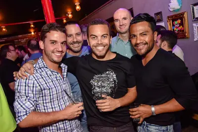 a group of men posing for a picture at a party at Hotel Gaythering - Gay Hotel - All Adults Welcome in Miami Beach